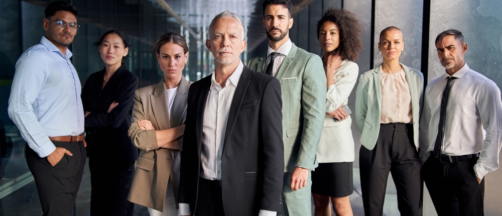 Business,Group,Portrait,Posing,With,Confidence,Attitude.,Successful,Diverse,Team